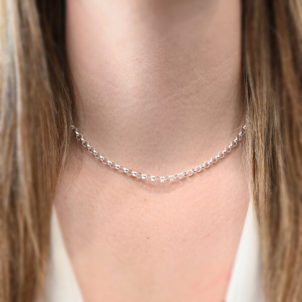 Sterling Silver Roxy Rolo Chain - 16-19" Shiny shown on model with white shirt and brown hair