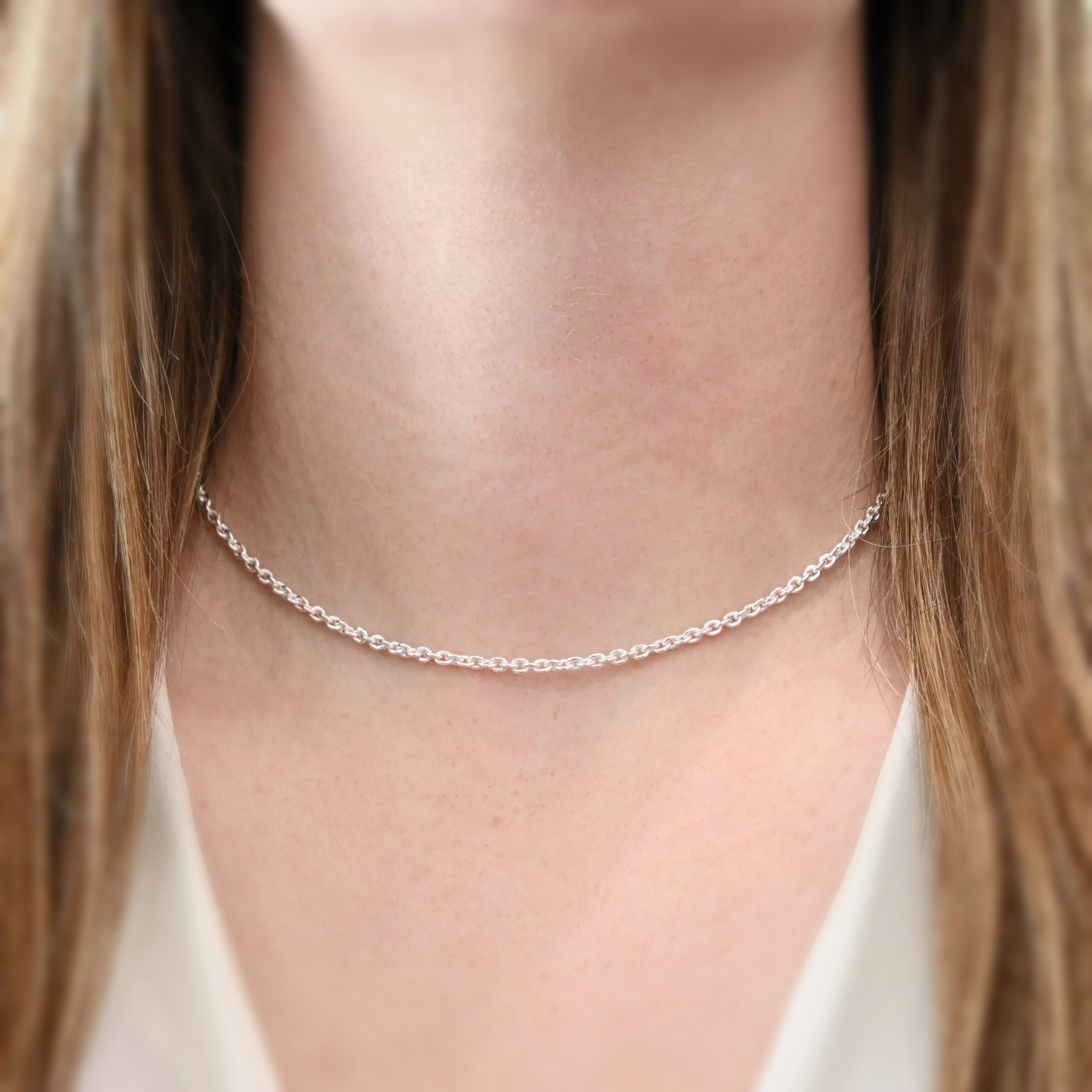 Maria Chain - 16-19" Shiny Sterling Silver Maria Chain - 16-19" Shiny shown on model with white shirt and brown hair