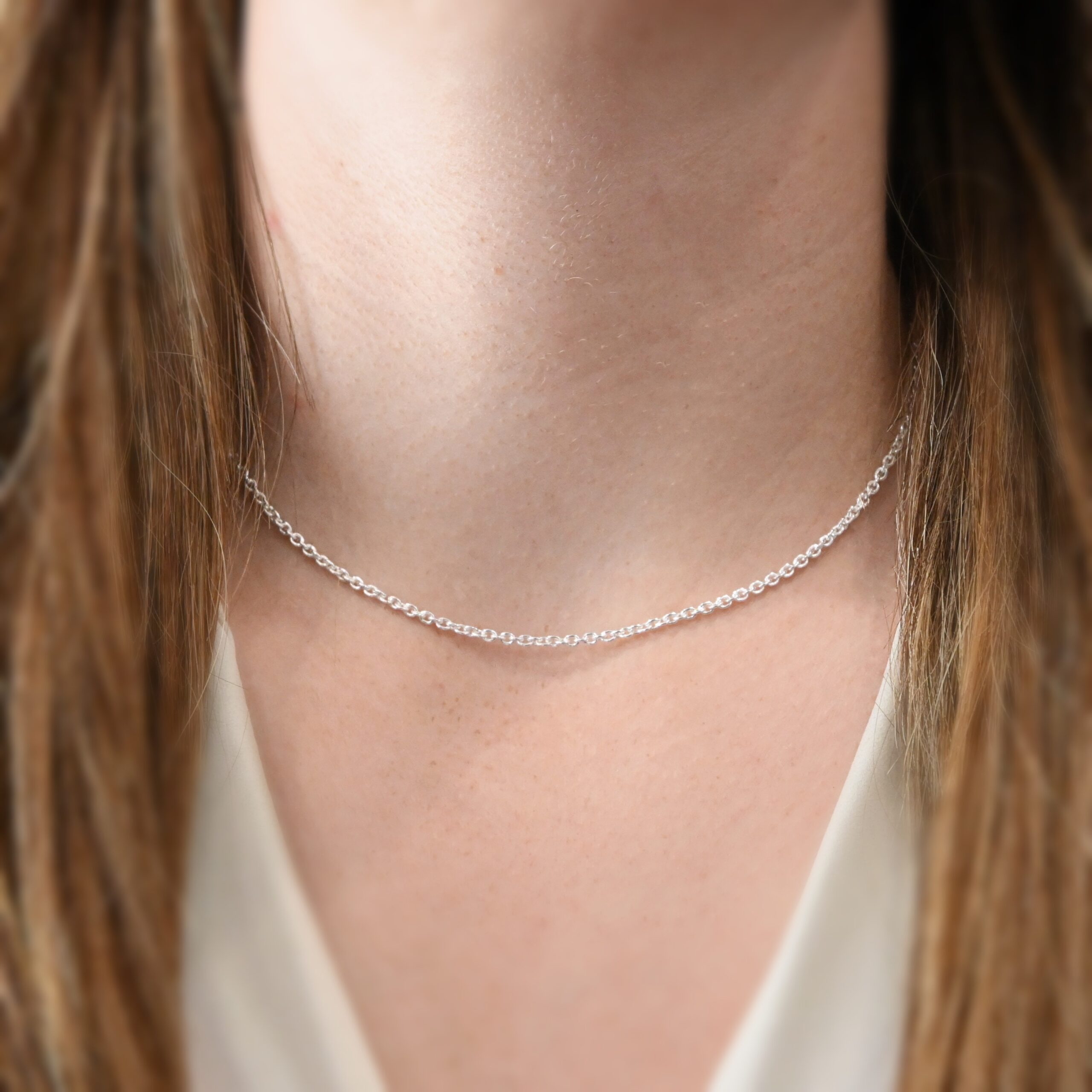 Sterling Silver Savannah Chain - 16-19" Shiny shown on model with white shirt and brown hair