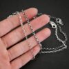 Sterling Silver shiny & oxidized Olivia Chain shown in hand