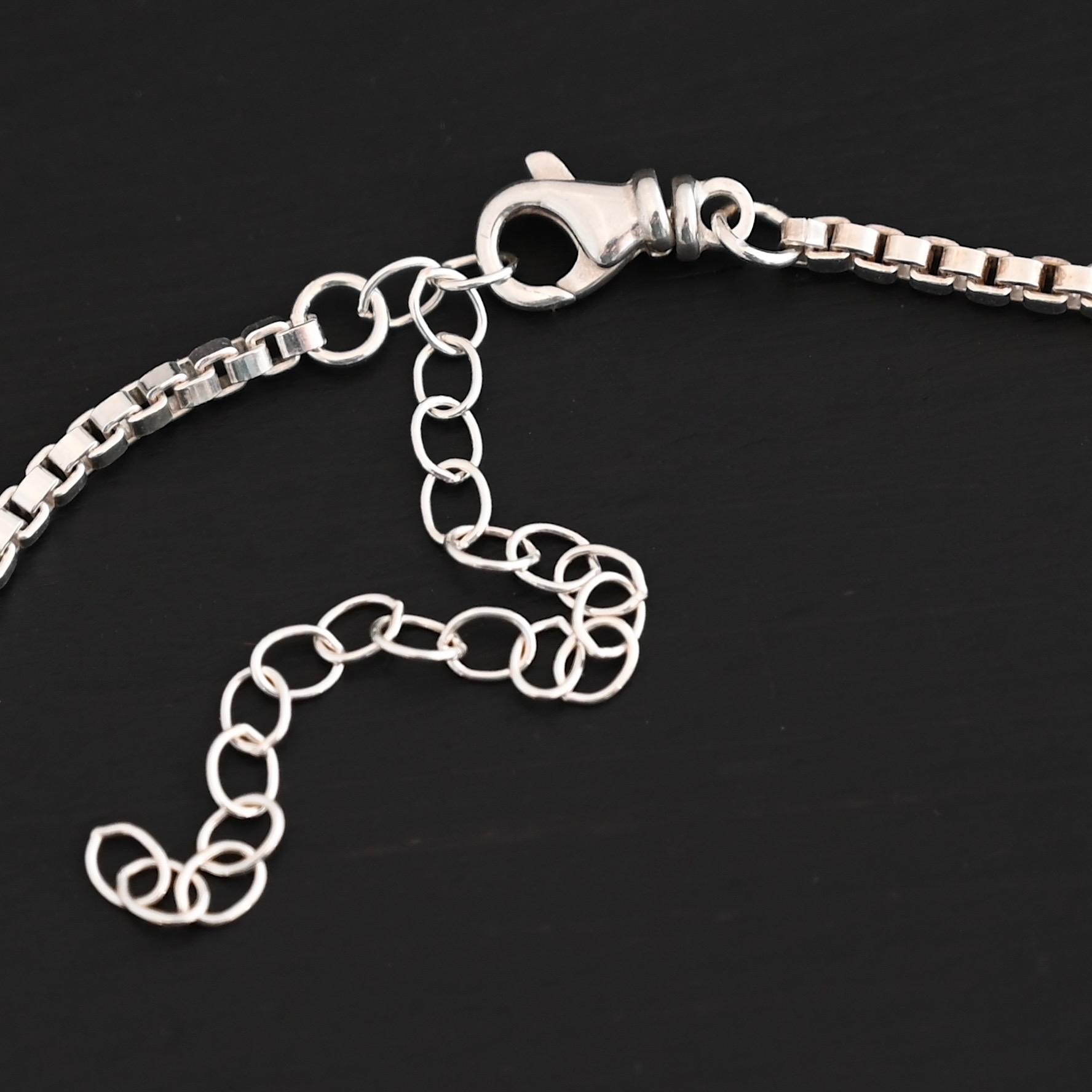 Sterling Silver Briggs Box Chain - Shiny shown on dark background