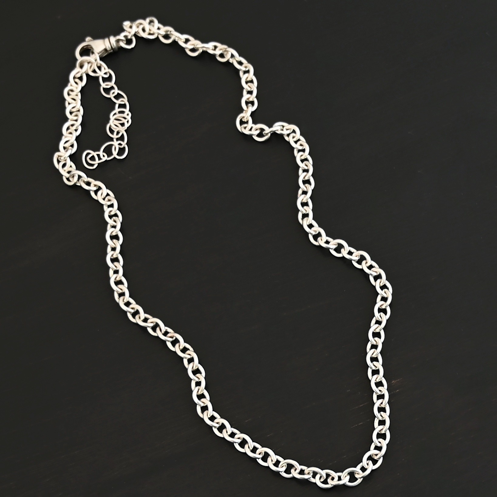 Joy Chain - Shiny Sterling Silver Joy Chain - Shiny shown on dark background
