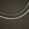 Sterling Silver shiny & oxidized Rachel Rolo Chain on dark background