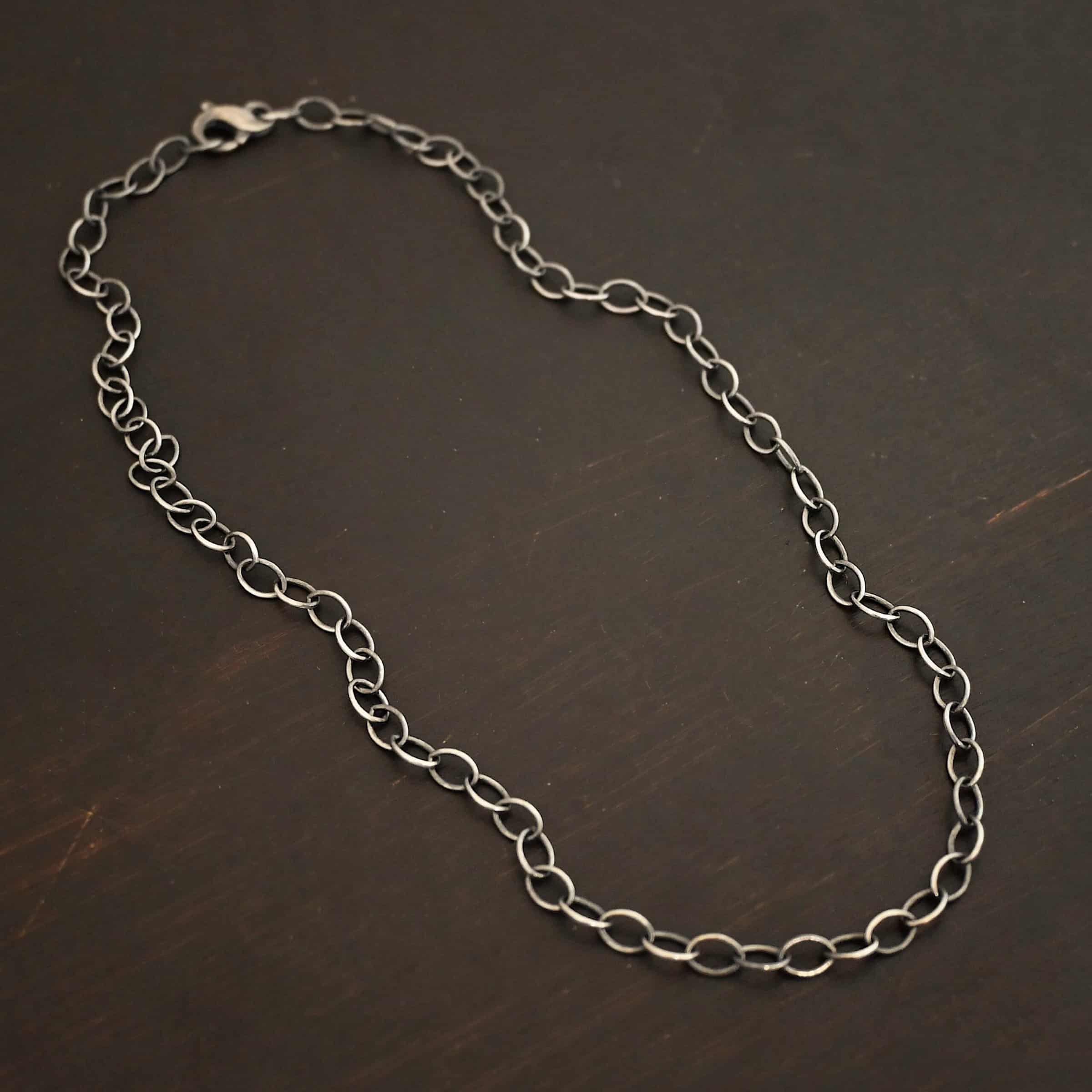 Sterling Silver oxidized Willow Chain on dark background
