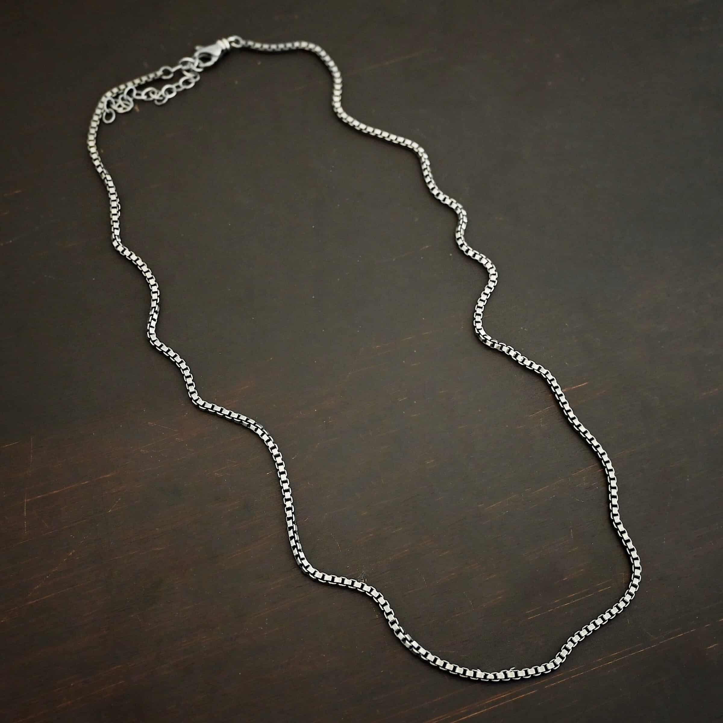 Sterling Silver oxidized Briggs Box Chain on dark background