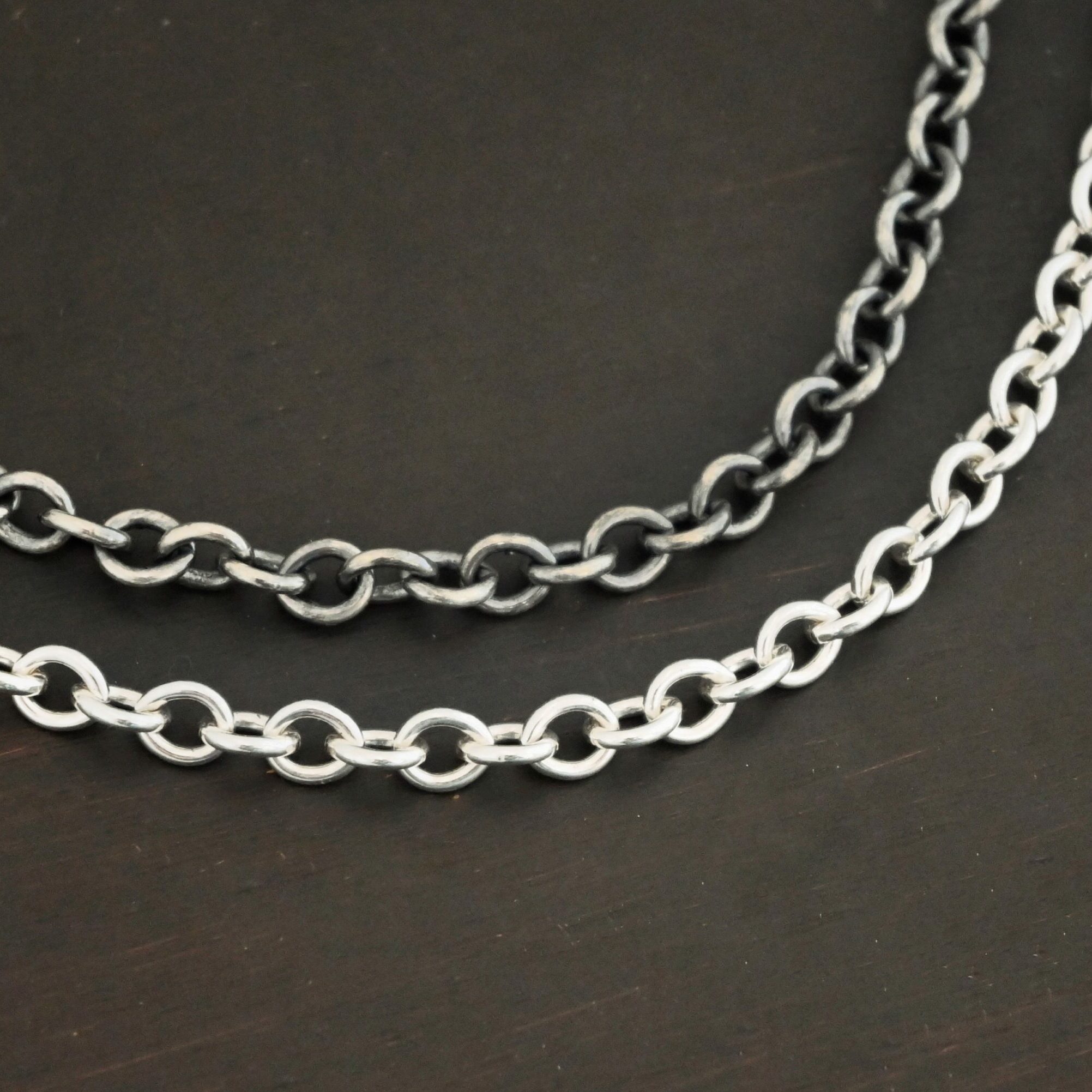 Sterling Silver Joy chain shown shiny & oxidized on dark background