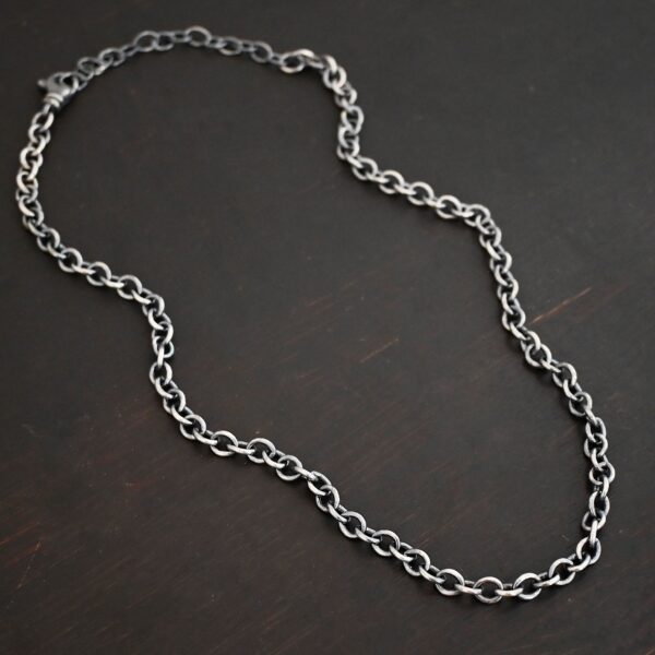 Sterling Silver Joy chain shown oxidized on dark background