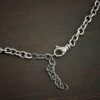Sterling Silver Joy chain shown oxidized on dark background