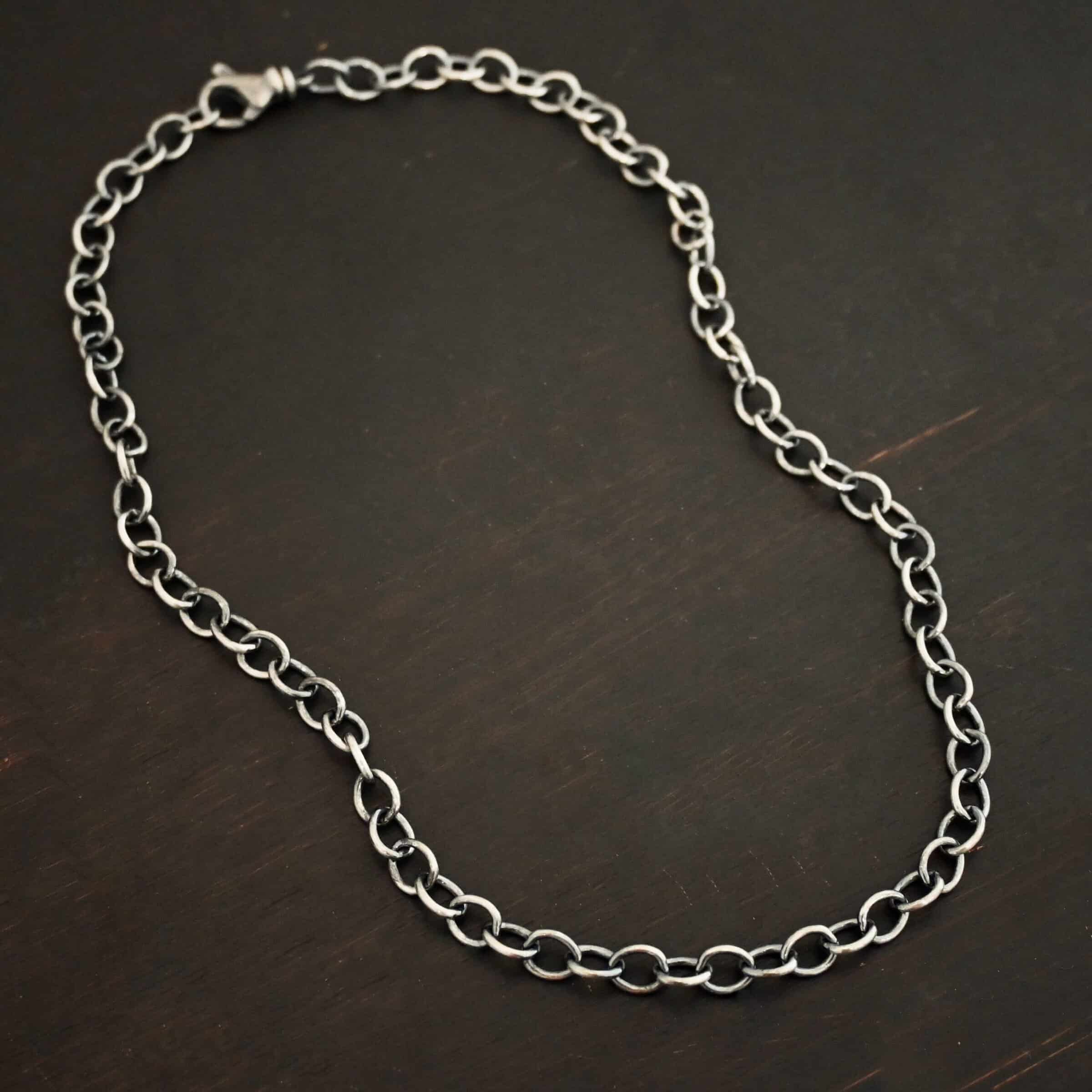 Sterling Silver Jay chain shown oxidized on dark background
