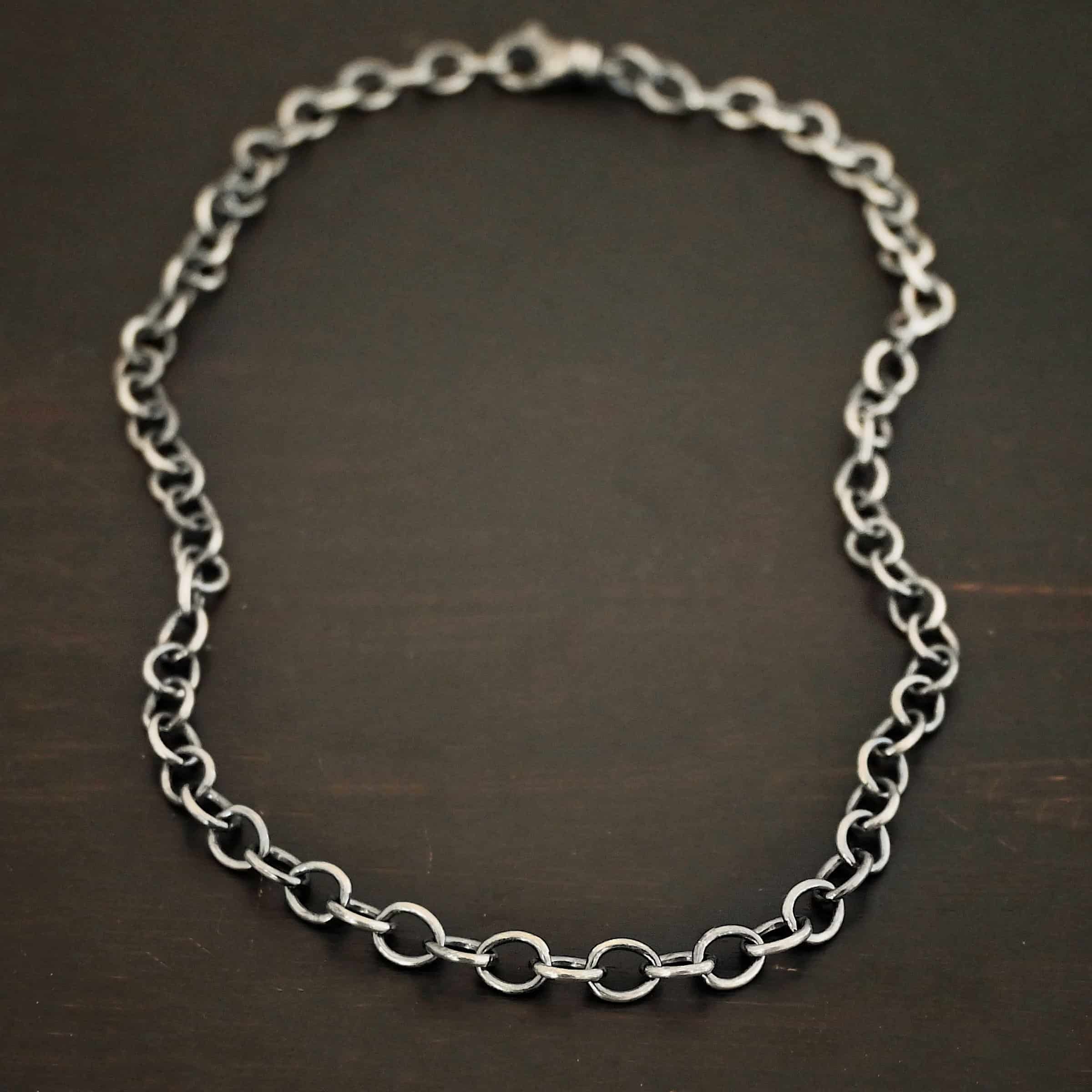 Sterling Silver Jay chain shown oxidized on dark background