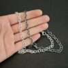 Sterling Silver Jay chain shown shiny & oxidized in hand