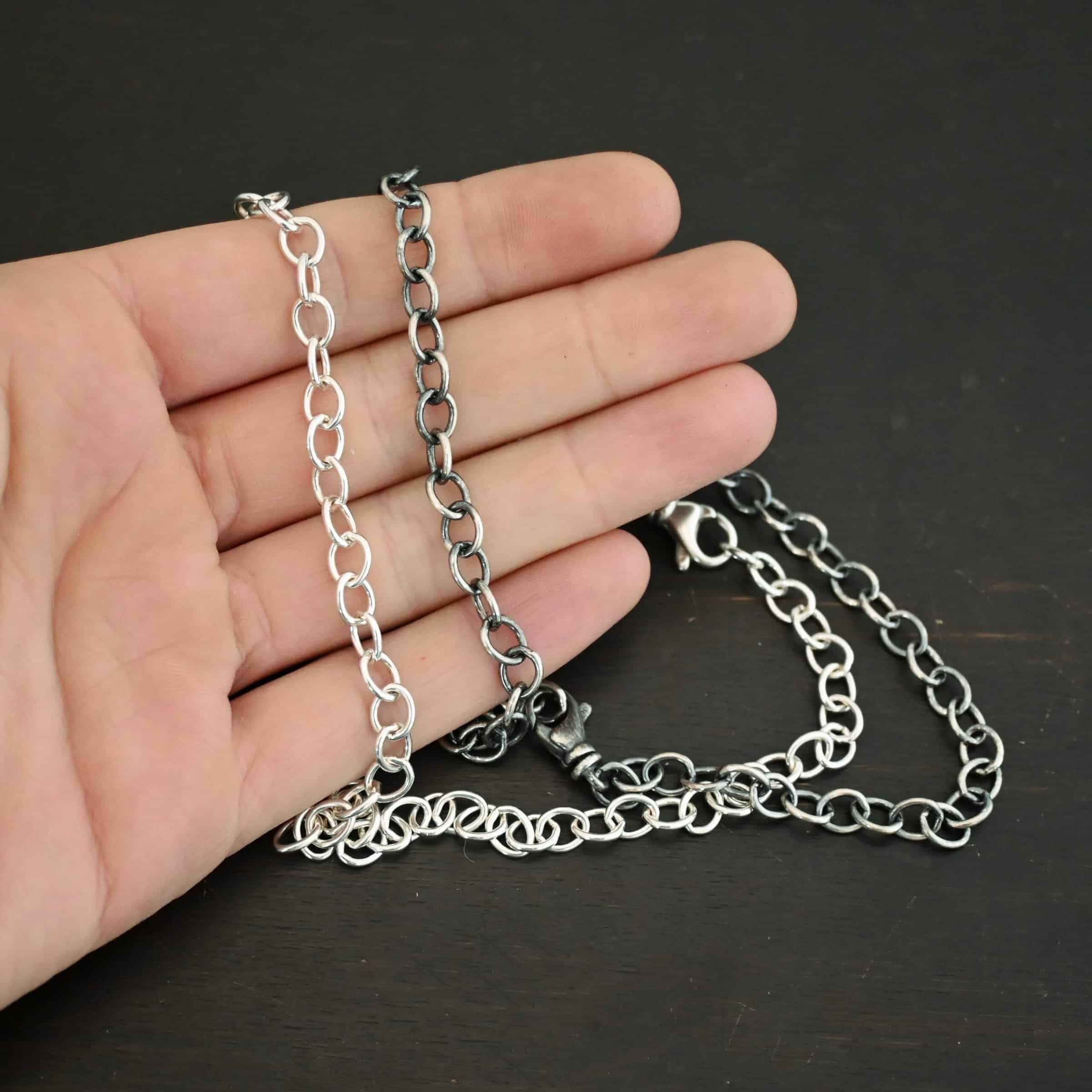 Sterling Silver Jay chain shown shiny & oxidized in hand