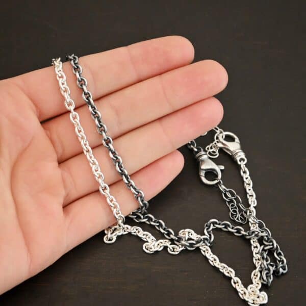 Sterling Silver Joan XL chain shown shiny & oxidized in hand