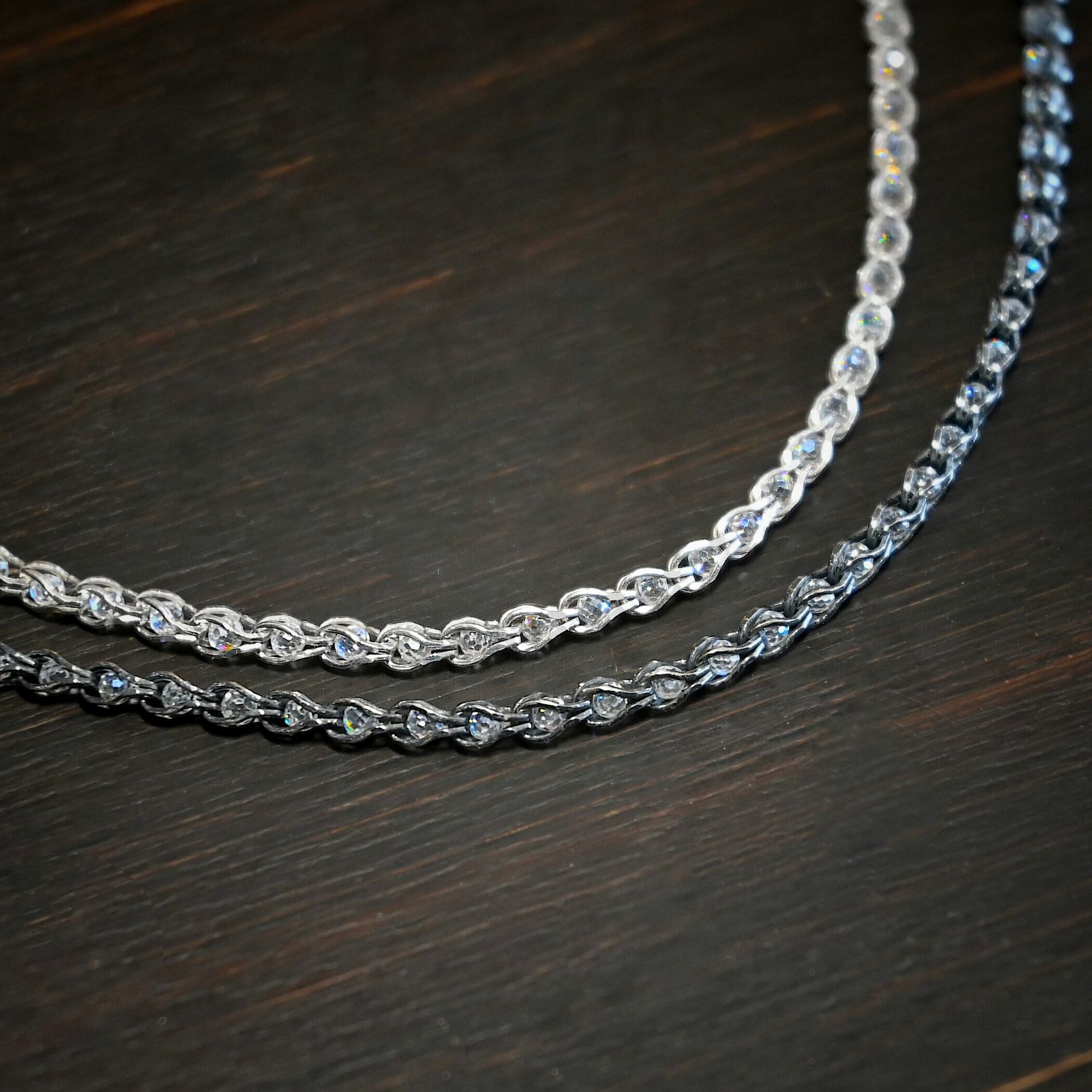 Scarlett Chain - Sterling Silver with crystals inside the links - shown shiny & oxidized in hand