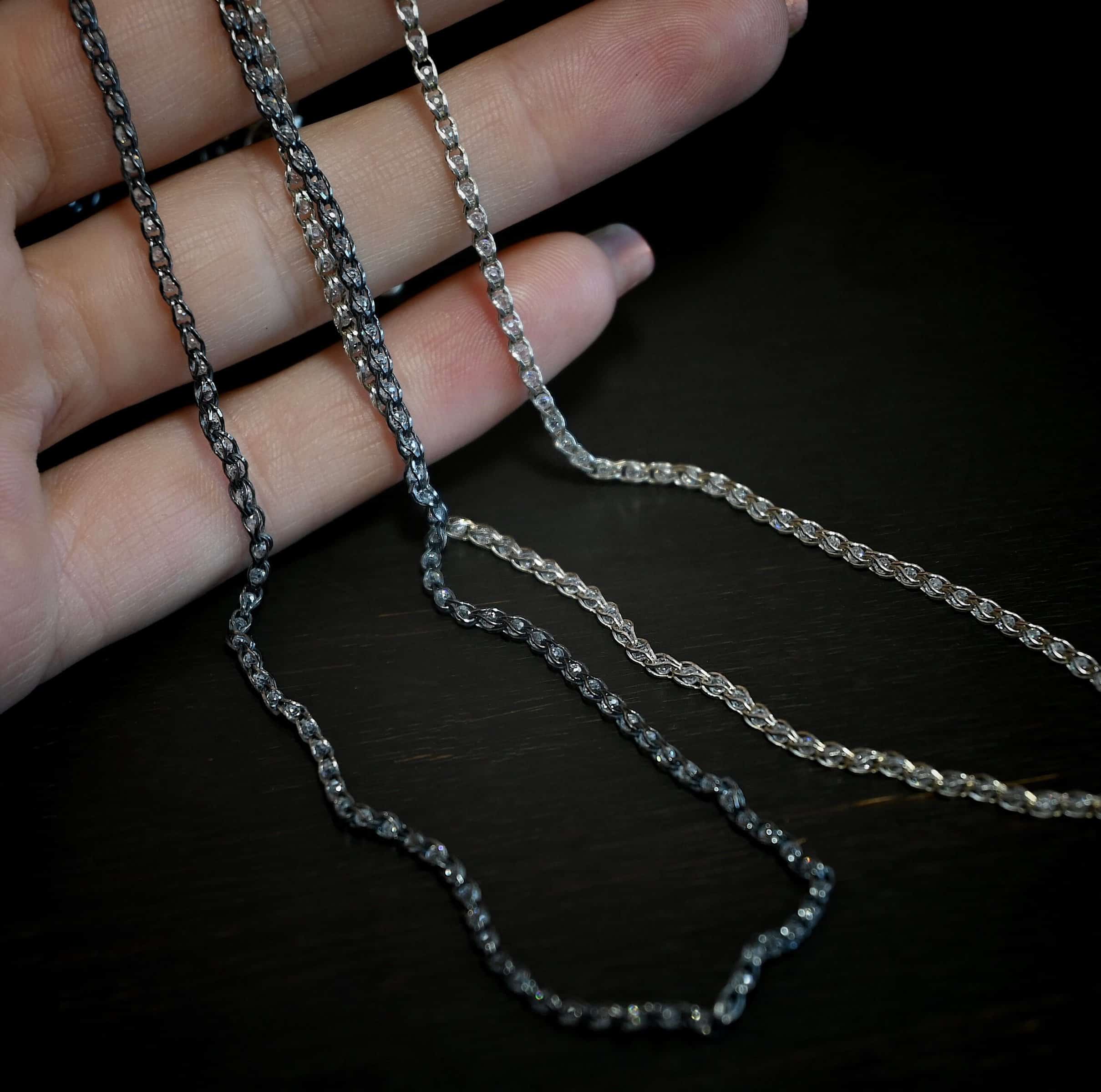 Scarlett Chain - Sterling Silver with crystals inside the links - shown shiny & oxidized in hand