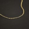14k gold filled Ruby Rolo Chain shown on dark background