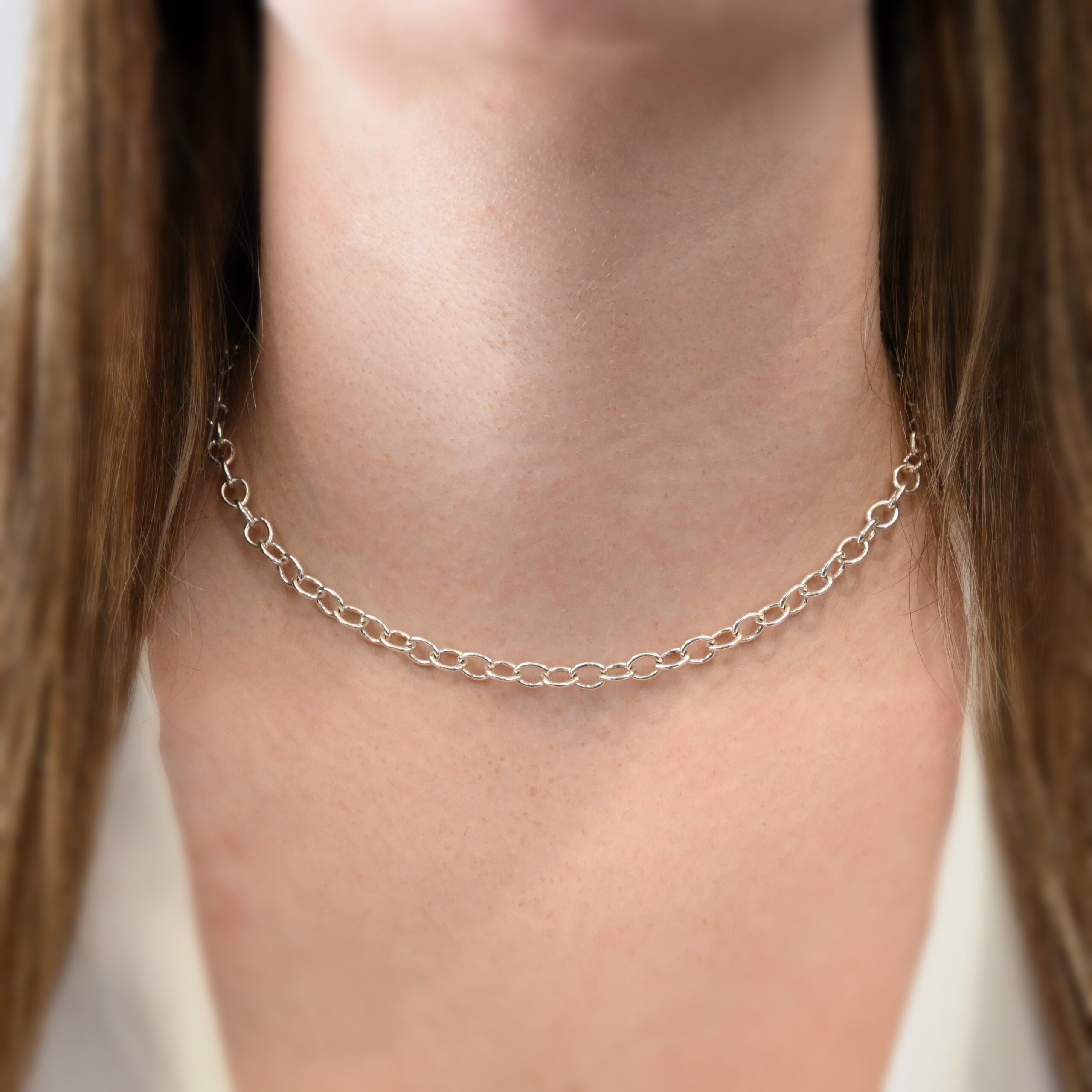 Sterling Silver Jay Chain - 16" Shiny shown on model with white shirt and brown hair