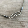 Sawyer Steel Wire Necklace shown on wood background