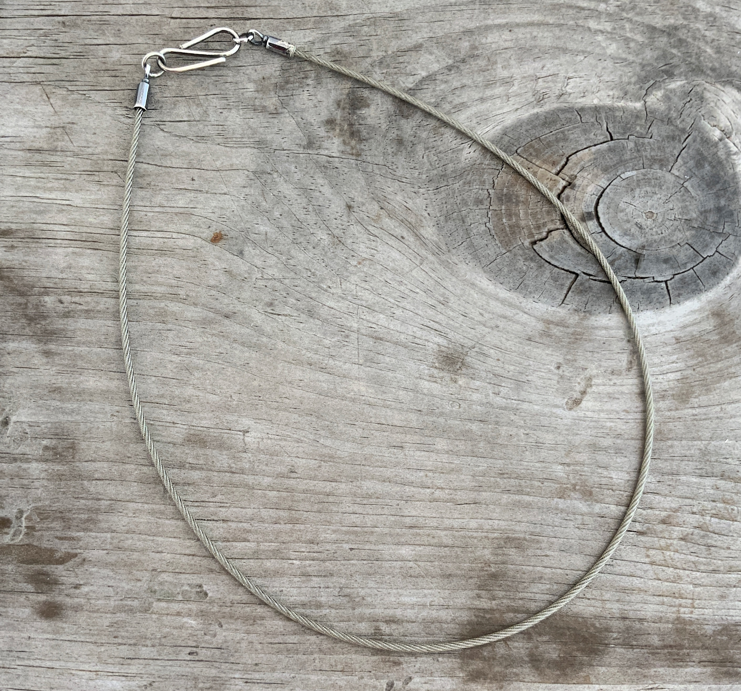 Sawyer Steel Wire Necklace shown on wood background