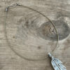 Sawyer Steel Wire Necklace shown on wood background