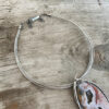 Susanna Stainless Necklace shown on wood background