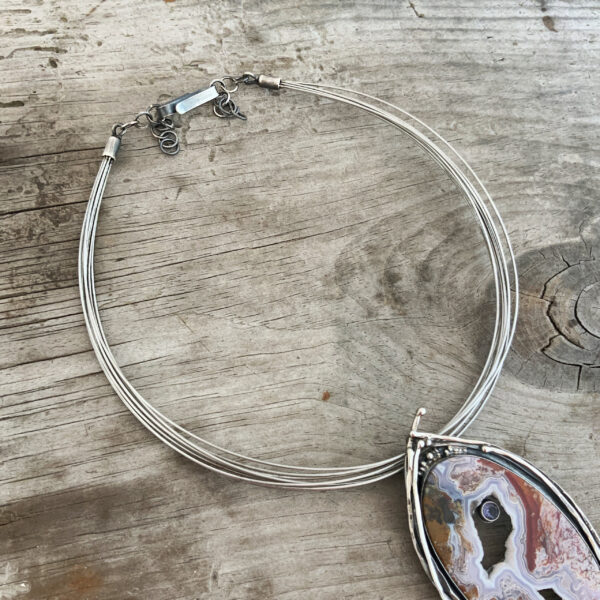 Susanna Stainless Necklace shown on wood background