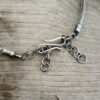 Susanna Stainless Necklace shown on wood background