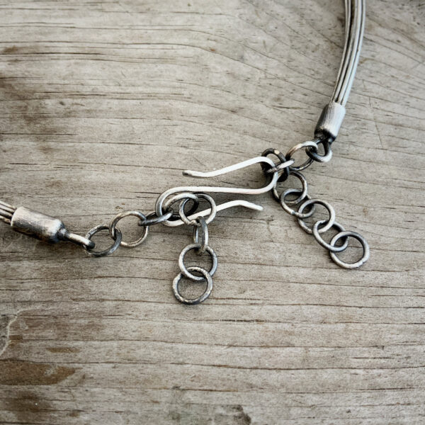 Susanna Stainless Necklace shown on wood background