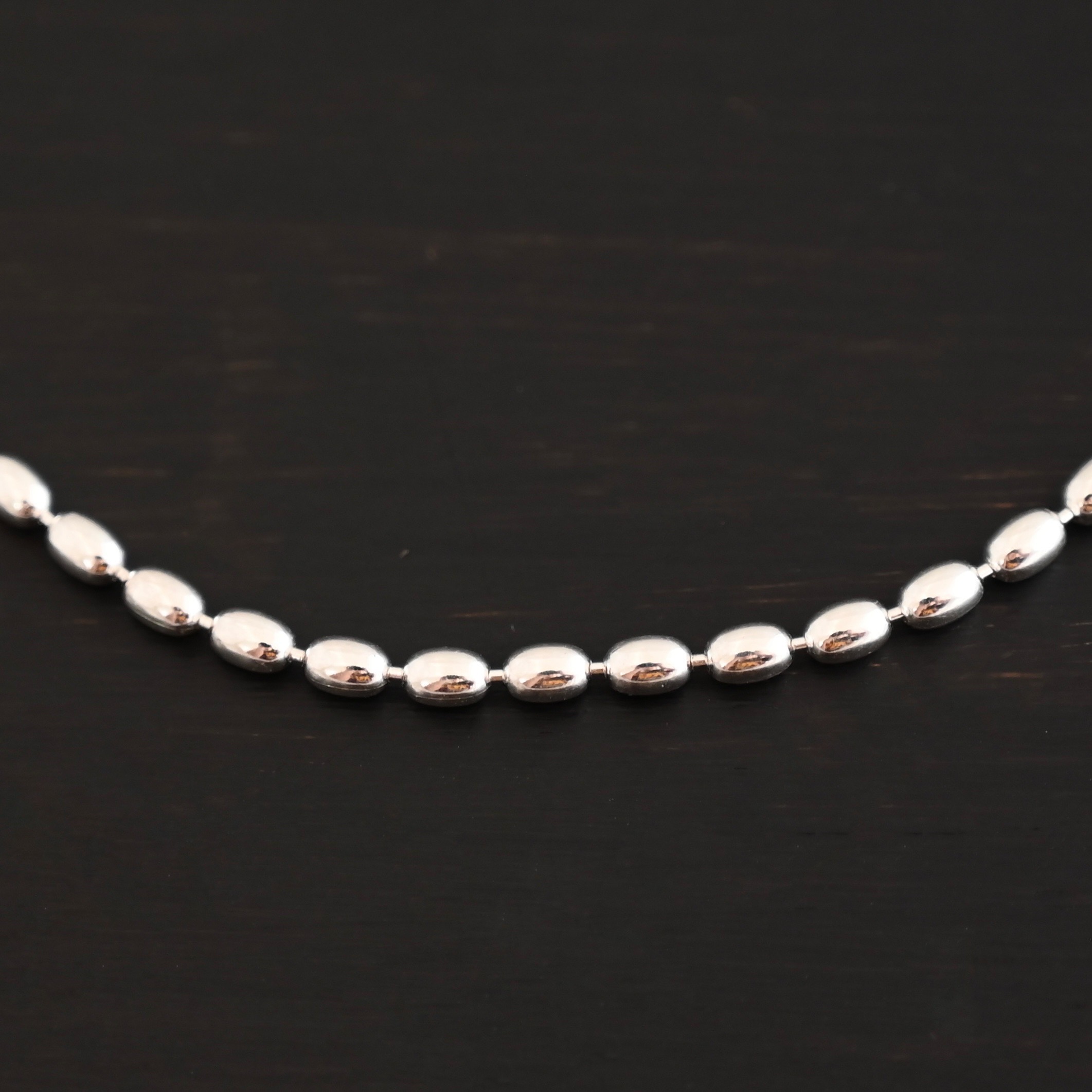 Bryn Beaded Chain - 3mm shiny shown on dark background