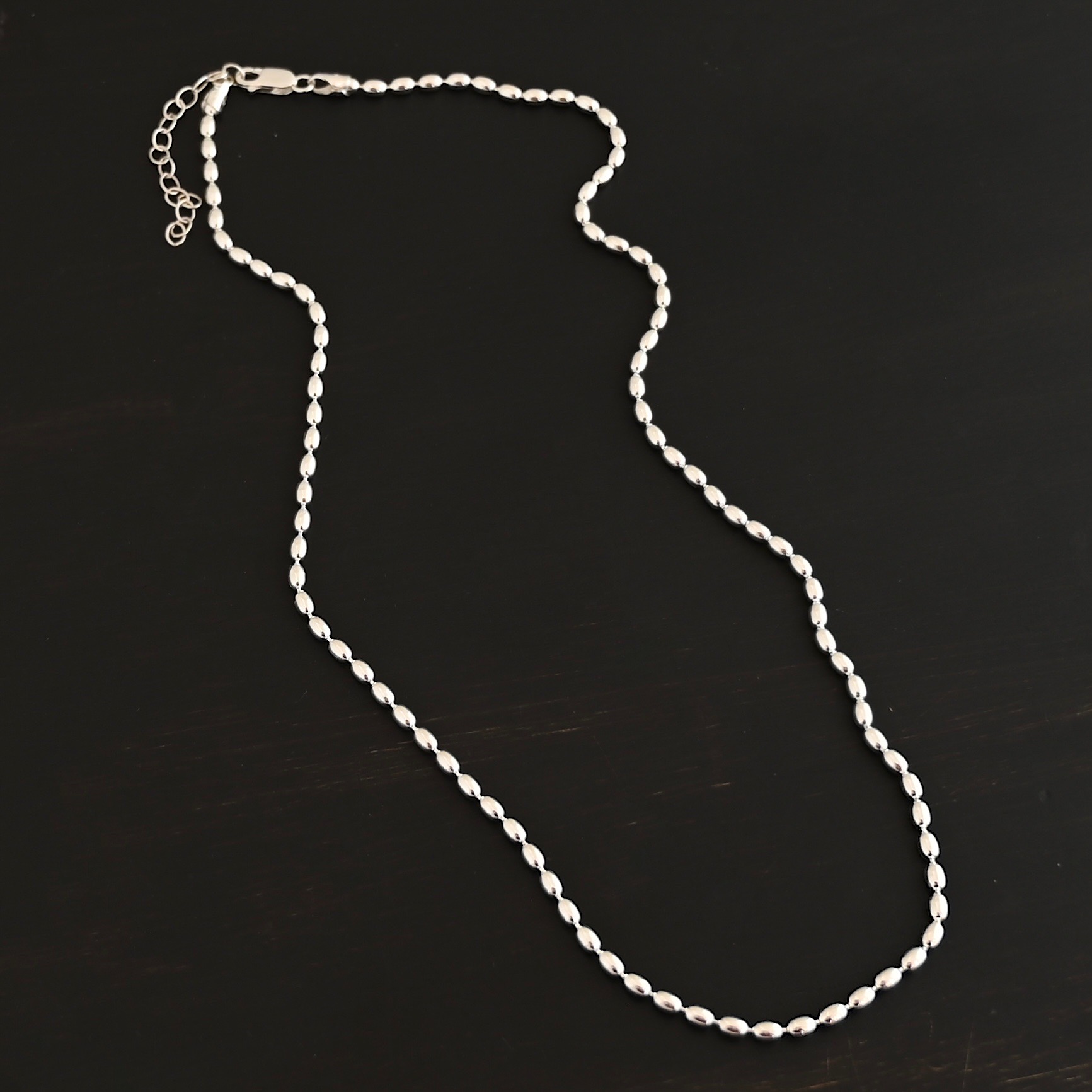 Bryn Beaded Chain - 3mm shiny shown on dark background