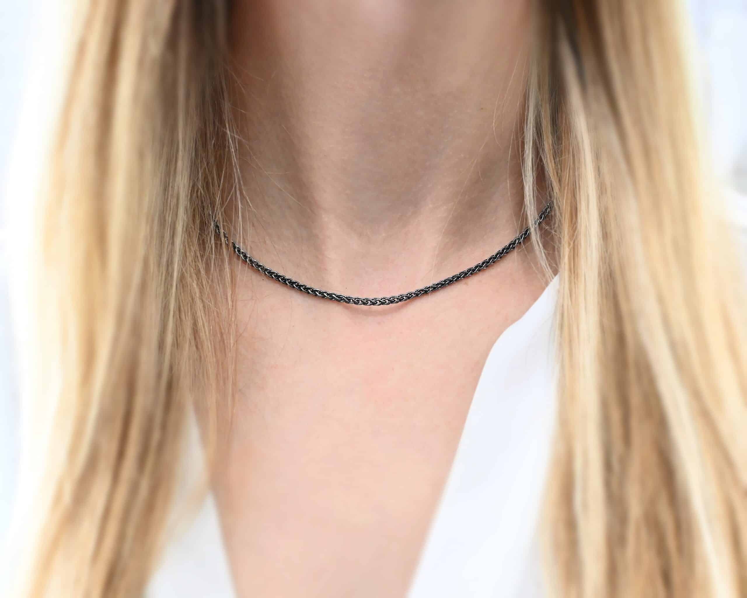 Sterling silver Frenchie chain - 16-18" Woven chain shown on model with white shirt and blonde hair