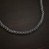 Frenchie chain - sterling silver Woven chain shown on dark background
