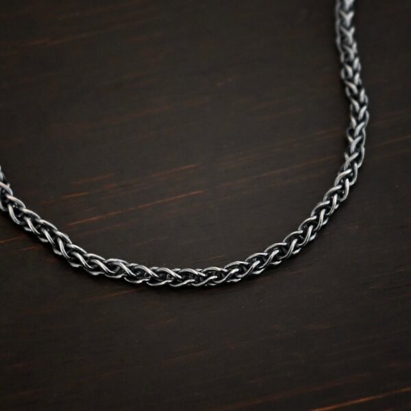 Frenchie chain - sterling silver Woven chain shown on dark background