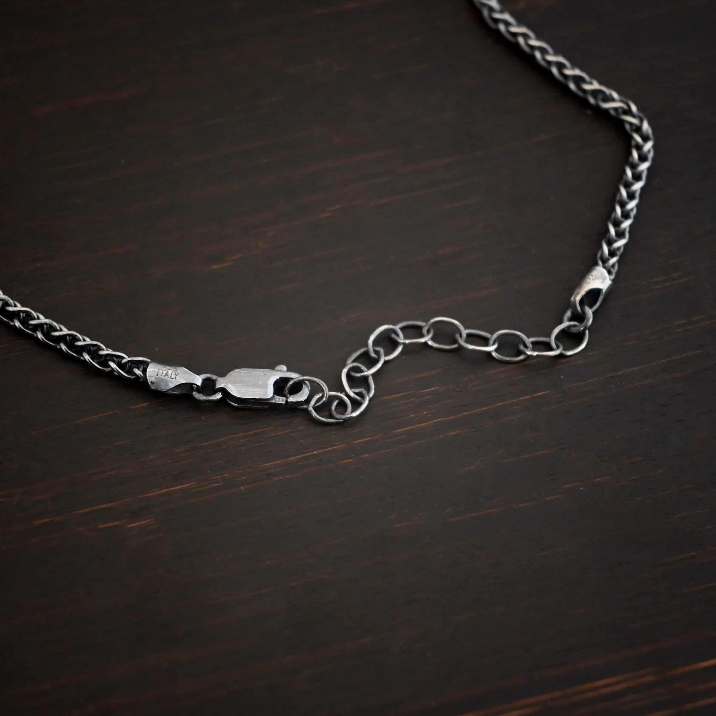 Frenchie chain - sterling silver Woven chain shown on dark background