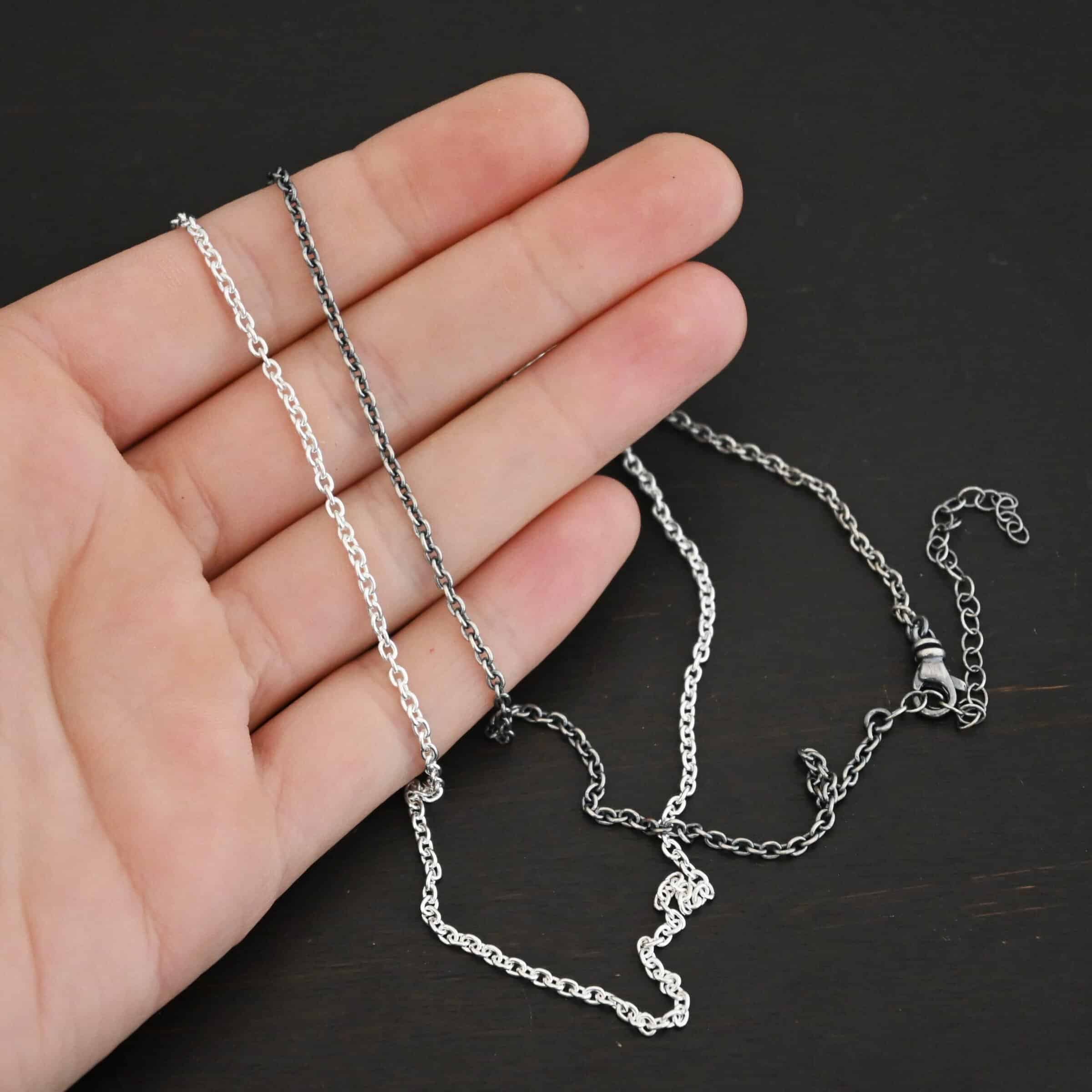 Sterling Silver shiny & oxidized Savannah Chain shown on hand