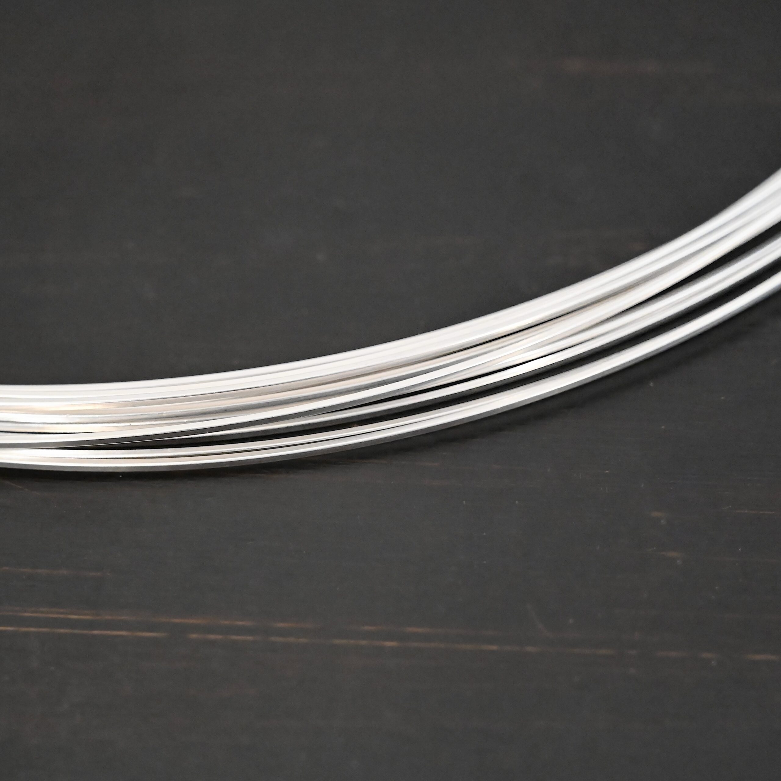 Sterling Silver Square Wire on dark background