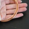 Copper Round Wire shown in hand