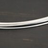 Silver Round Wire shown on dark background