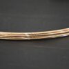 Gold Filled Round Wire shown on dark background
