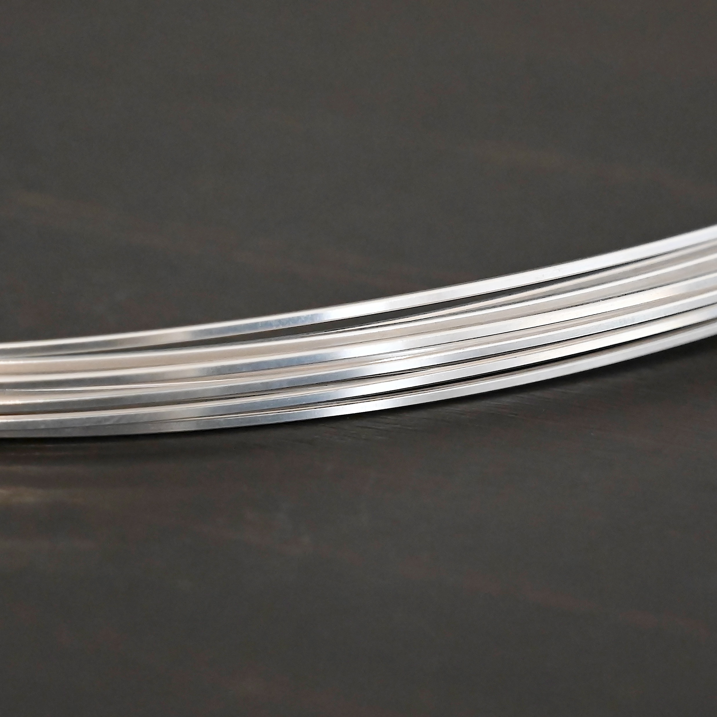 Sterling Silver Square Wire on dark background
