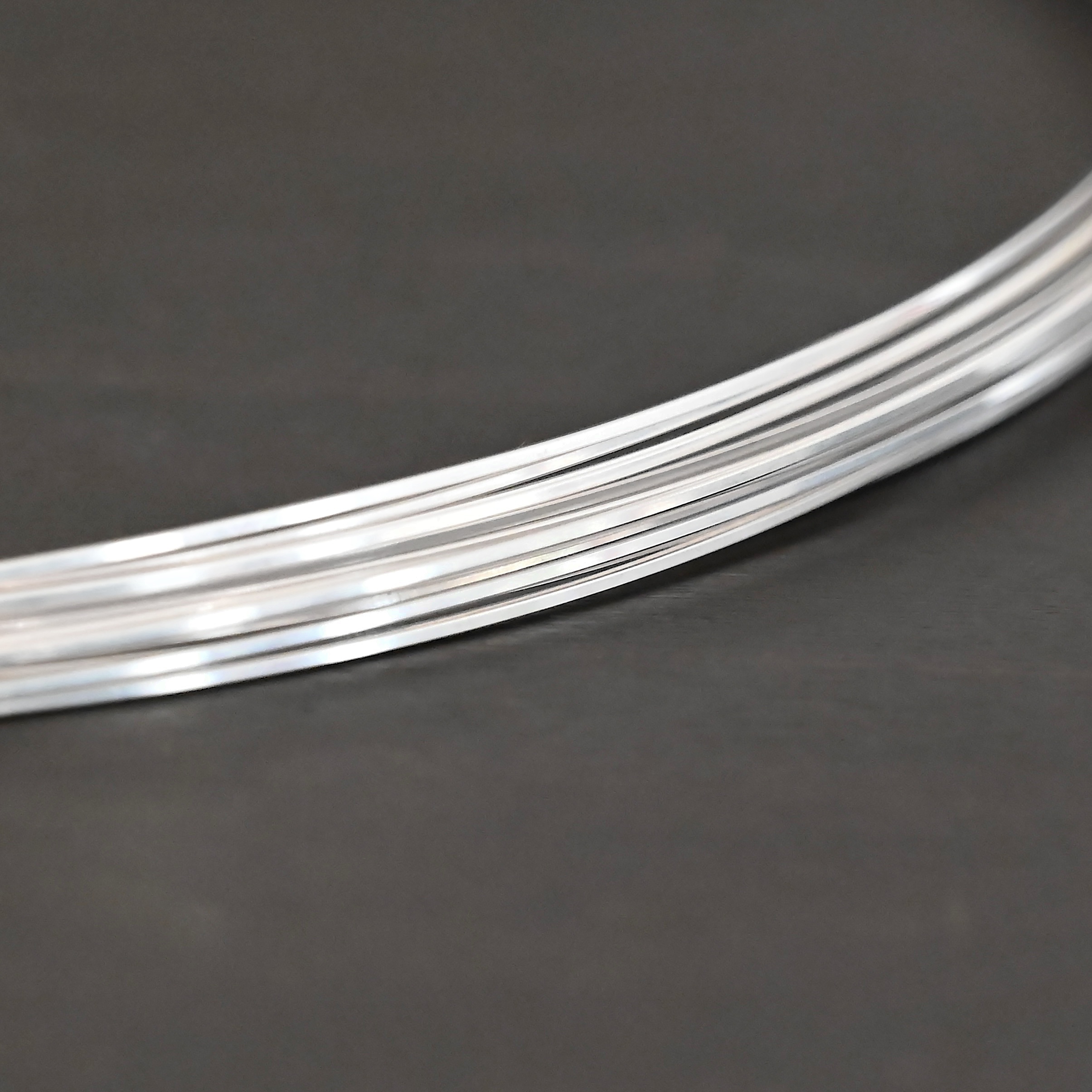 Sterling Silver Square Wire on dark background