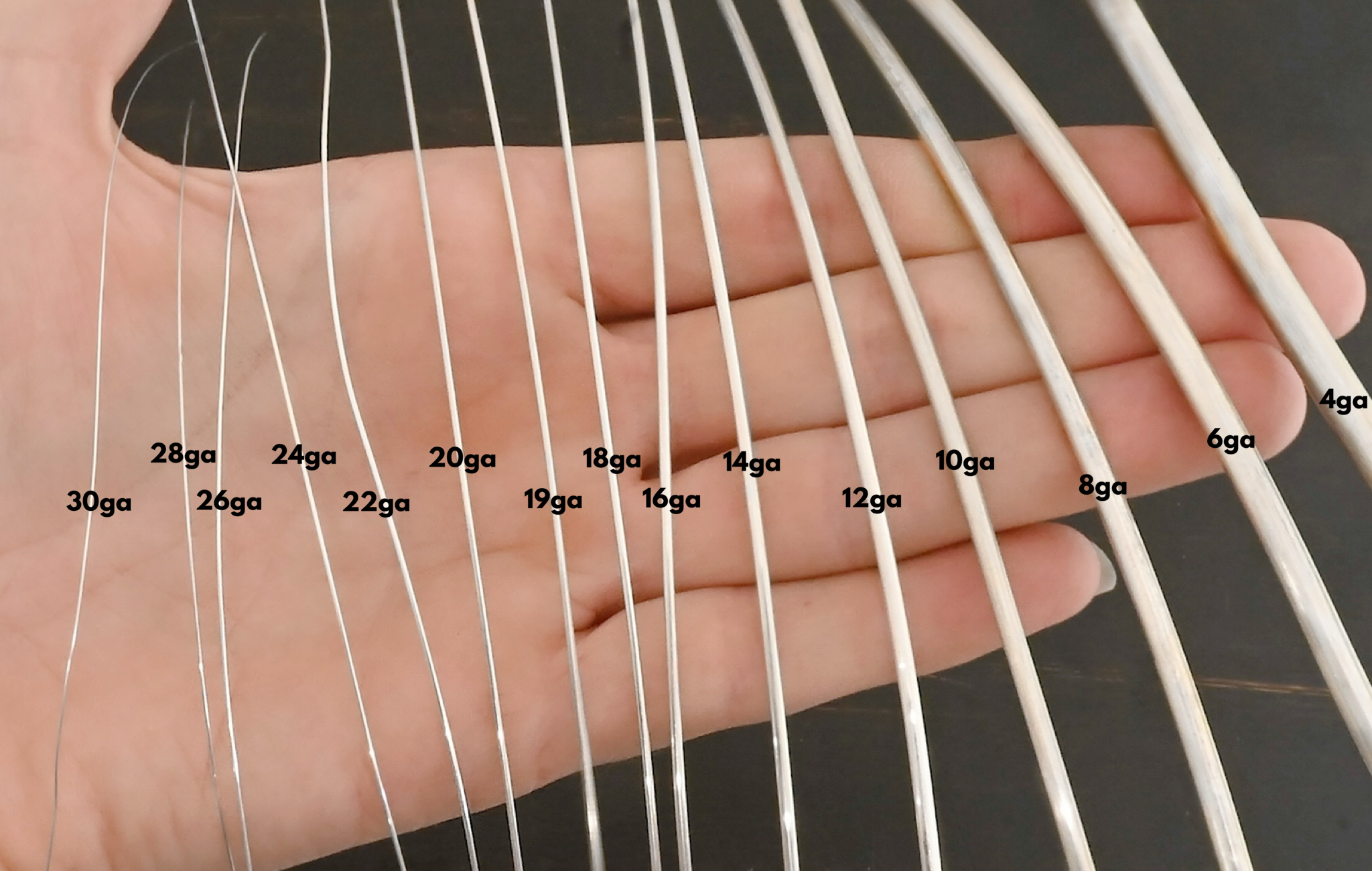 Silver Round shiny wire all sizes shown in hand