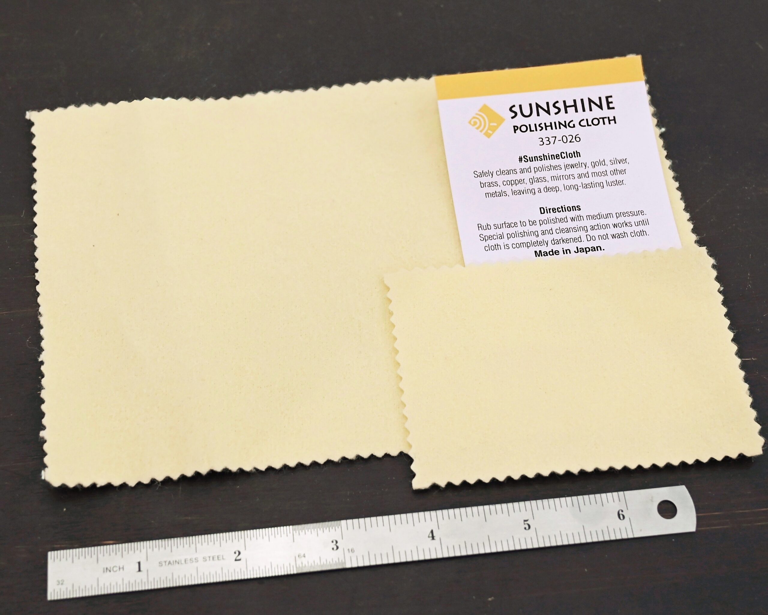 Yellow Jewelry Cleaning Cloth both sizes shown by ruler