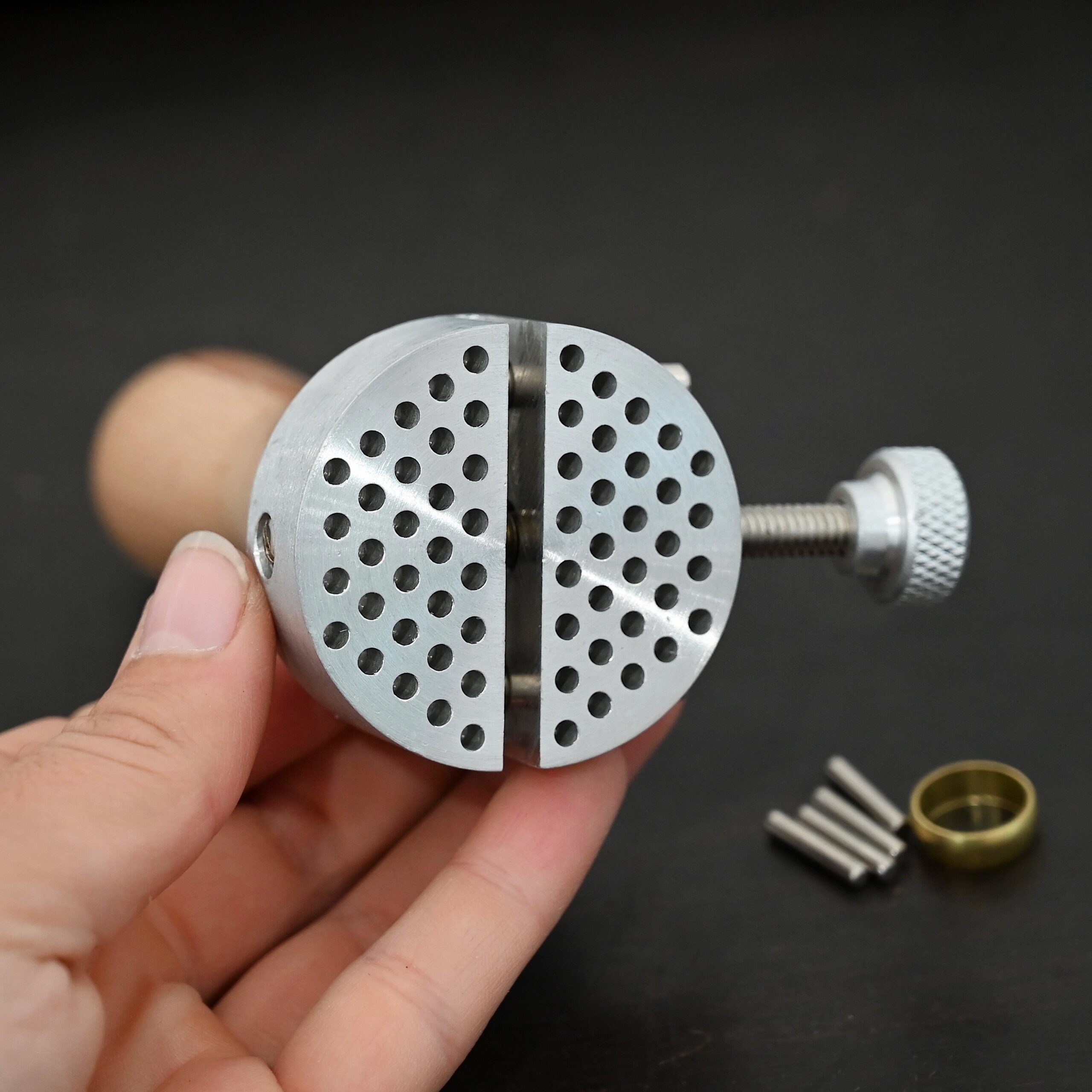 Wire jig Tool stainless steel and wooden handle shown in hand