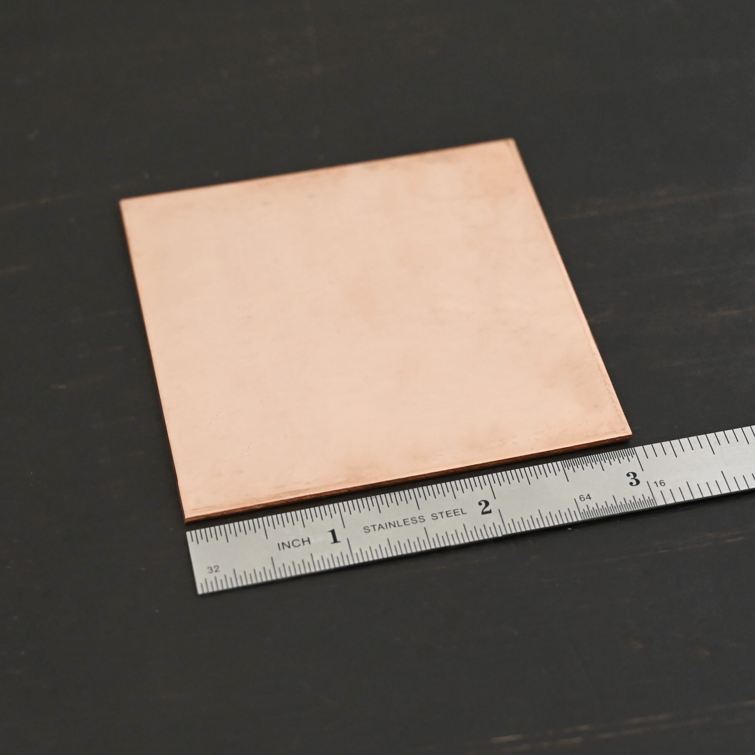 Copper Sheet 3x3" copper square sheets shown by ruler