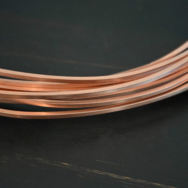 Copper Square Wire shown on dark background