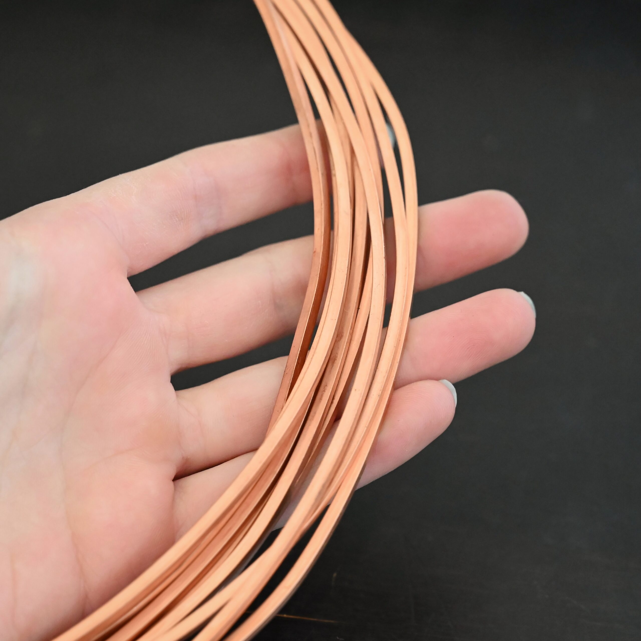 Copper Square Wire Copper Square Wire shown in hand