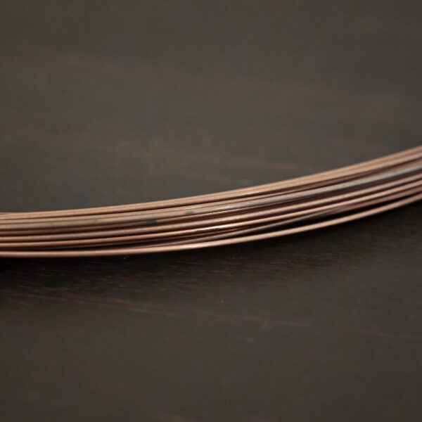 Copper Solder Wire shown on dark background
