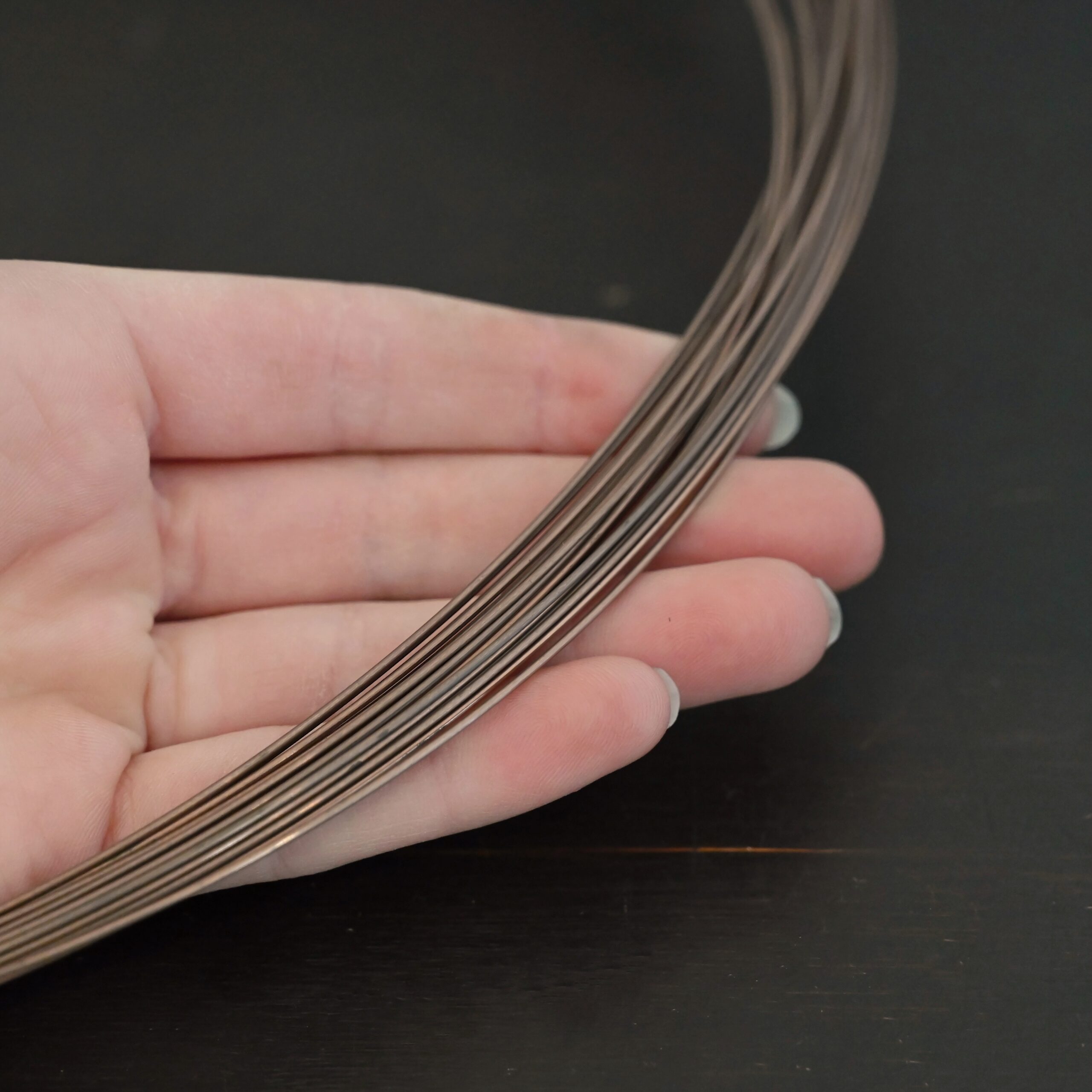 Copper Solder Wire shown in hand