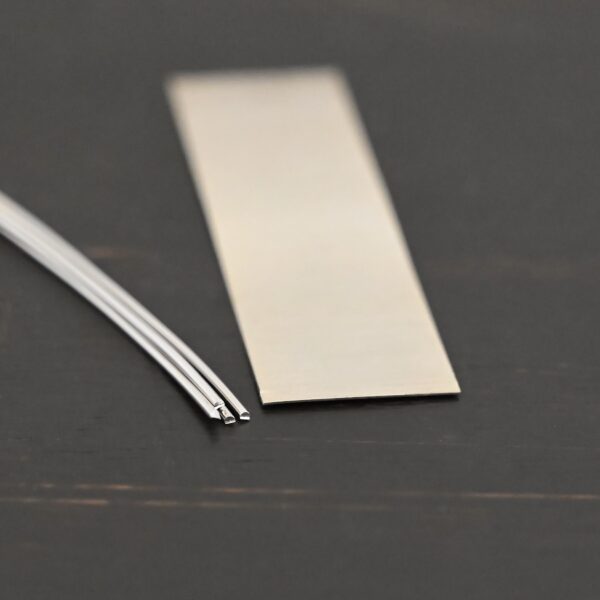Silver Solder Sheet & Wire on dark background